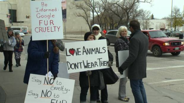 Animal-rights group protests wearing furs - image