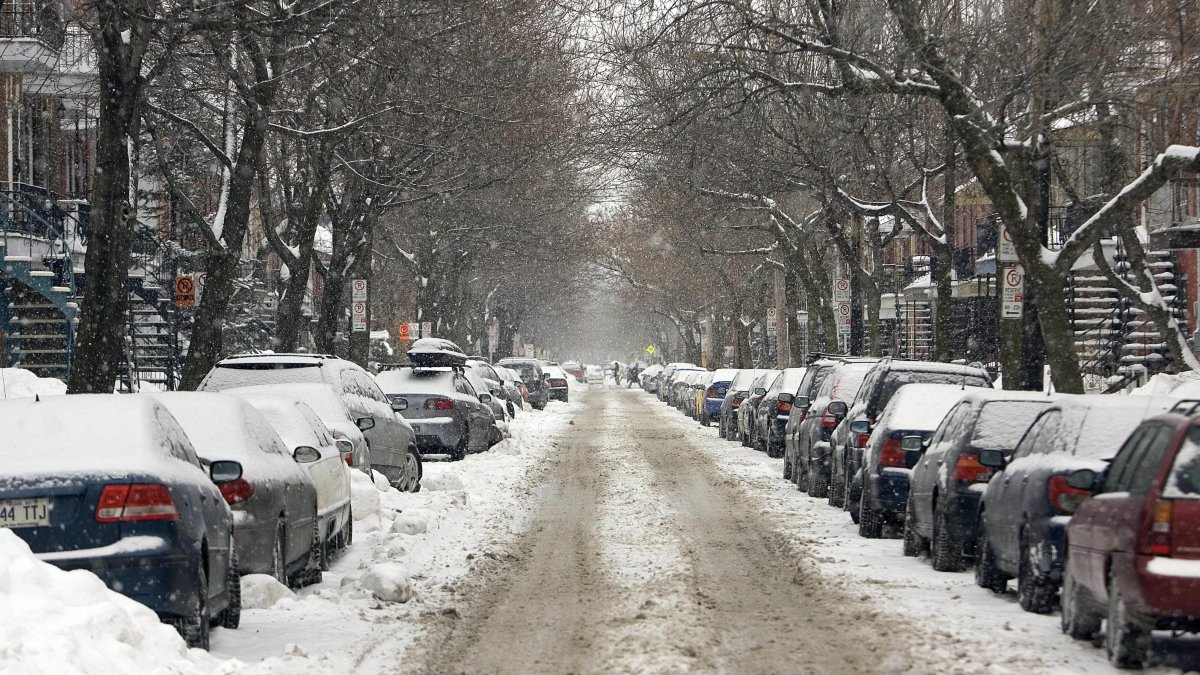 A street in the Plateau Mont-Royal district of Montreal, Canada, is covered with snow.