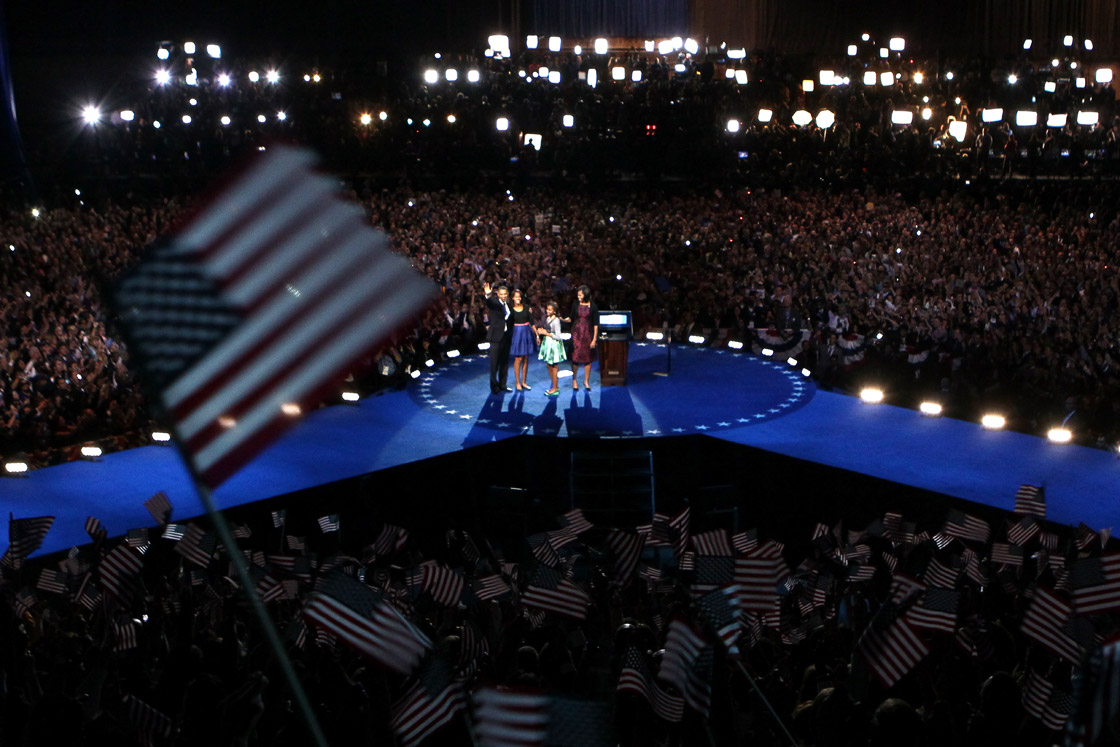 U.S. President Barack Obama walks on stage with first lady Michelle Obama and daughters Sasha and Malia to deliver his victory speech on election night at McCormick Place November 6, 2012 in Chicago, Illinois. Obama won reelection against Republican candidate, former Massachusetts Governor Mitt Romney.