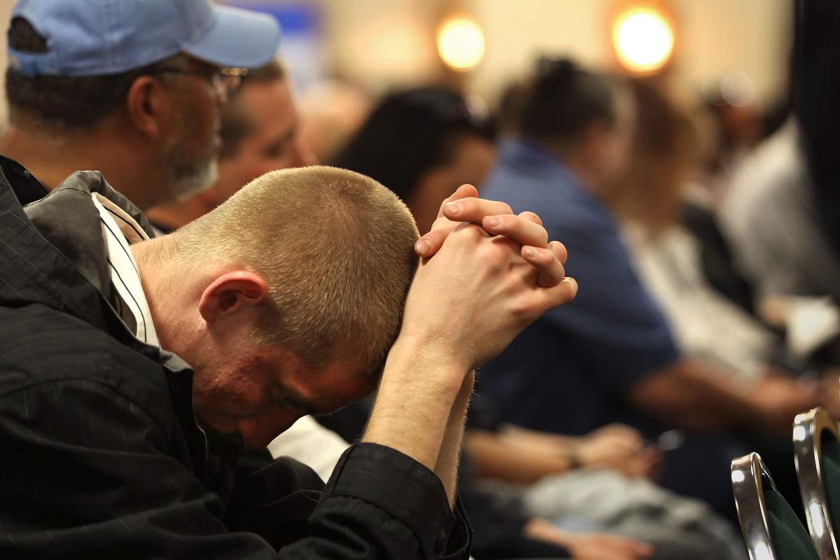 Unemployed Coloradans sit through the opening session of the 'Job Hunters Boot Camp' on April 19, 2010 in Aurora, Colorado.