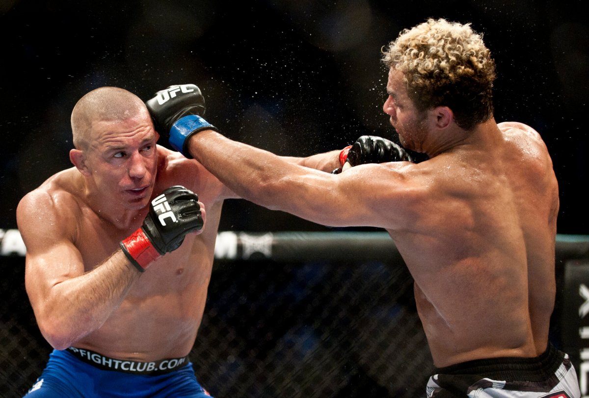 UFC Canada's Tom Wright is in Ottawa, hoping to lobby the federal government to amend the nation's prizefighting laws.   PICTURED ABOVE: Montreal native Georges St-Pierre, the UFC's most popular champion, uses his jab to keep challenger Josh Koscheck at bay in their 2010 welterweight title fight. 