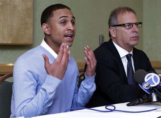Sheldon Stephens, left, accompanied by his attorney Jeff Herman, addresses a news conference, in New York, Tuesday, March 19, 2013. 