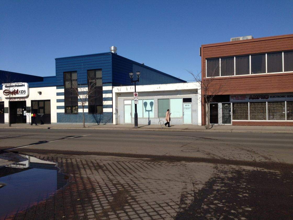 The woman who outraged people around 118th Avenue by seeking to open a massage parlour near a youth centre has dropped the proposal.