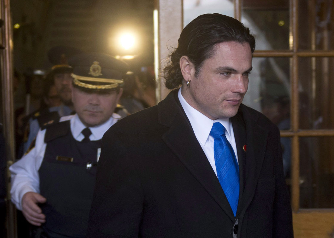 Senator Patrick Brazeau leaves the Senate after being suspended, Tuesday February 12, 2013 in Ottawa.