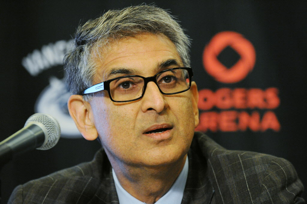 FILE -- VANCOUVER, B.C.: OCTOBER 8, 2010 -- Nadir Mohamed, President and CEO, Rogers Communications, speaks at a press conference as the team formally announces the deal that gives the media company naming rights to Rogers Arena in Vancouver in this October 8th, 2010 file photo. (Stuart Davis/PNG) For John Morrissy (Financial Post). CEO-PAY.