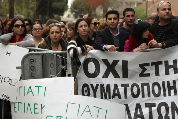 
Citizens of Cyprus protested this week against a government plan to skim a portion of their savings in order to bail out the country's financial sector.