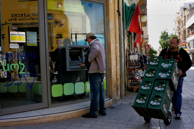 Capital constraints have been imposed on Cypriot depositors to stem a run on banks. The country is also girding for a severe downturn in the economy. 