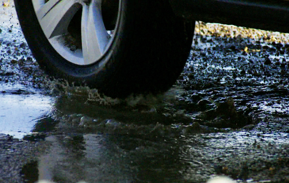 Motorists mending winter collisions transition to potholes