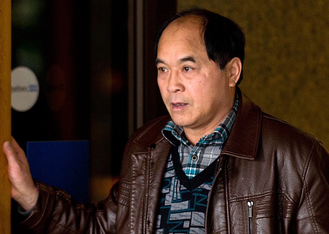 Daran Lin, father of murder victim Jun Lin, leaves the courthouse in Montreal Friday, March 15, 2013 where he his attending the preliminary hearing for Luka Rocco Magnotta, the man charged in connection with the infamous body-parts case that made international headlines.