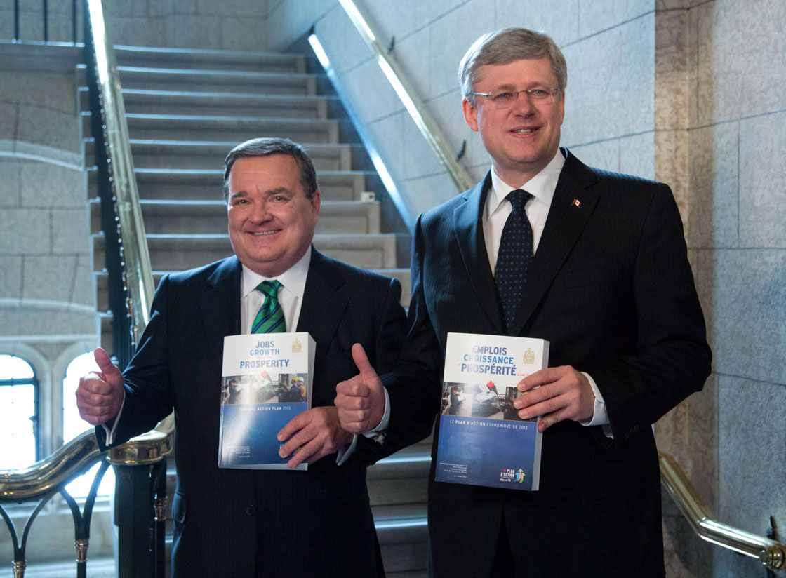 Finance Minister Jim Flaherty and Prime Minister Stephen Harper enter the House of Commons to table the budget on Parliament Hill in Ottawa on Thursday March 21, 2013. 