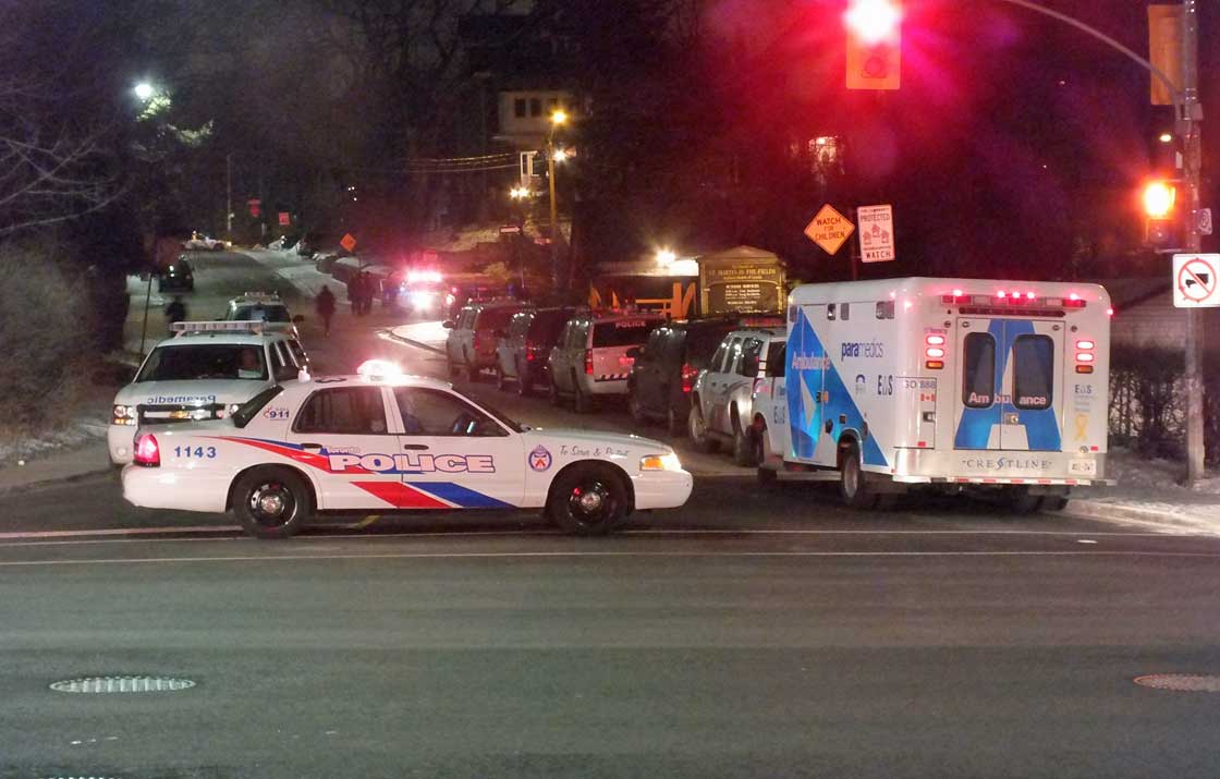 Police respond to a shooting at an apartment on Glenlake Avenue, just north of High Park subway station, on Tuesday, March 19, 2013.