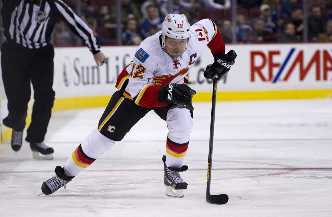Jarome Iginla of the Calgary Flames skates with the puck during NHL action against the Vancouver Canucks on January 23, 2013 at Rogers Arena in Vancouver.  