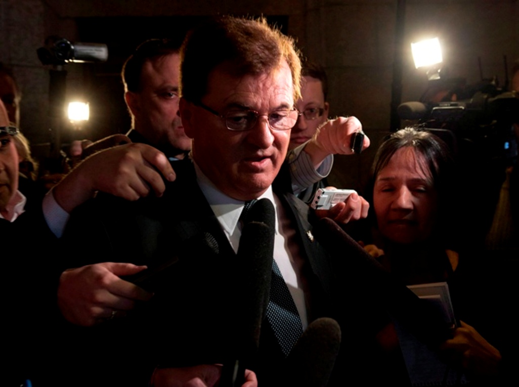Conservative MP Leon Benoit leaves caucus meetings on Parliament Hill Wednesday March 27, 2013 in Ottawa. THE CANADIAN PRESS/.