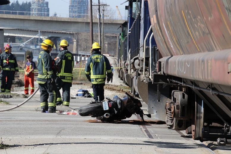A motorcycle was hit by a train in Surrey.
