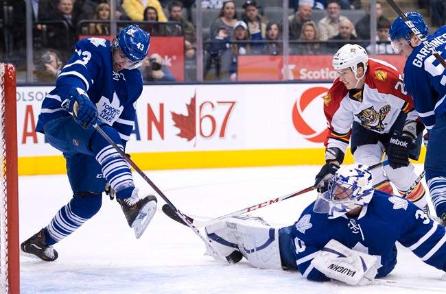 The Toronto Maple Leafs have acquired goaltender Jonathan Bernier in a trade with the Los Angeles Kings for forward Matt Frattin, goaltender Ben Scrivens and Toronto's second round pick.