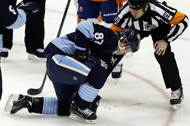 Crosby hit in mouth by puck will not return