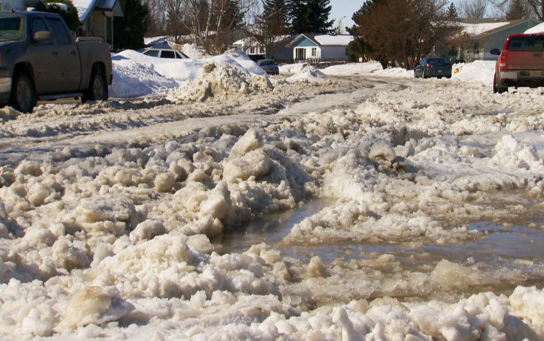 City of Saskatoon is urging motorists to be cautious on roads as melting snow freezes overnight.