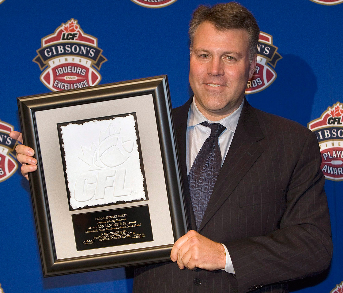 Ron Lancaster Jr. accepts the Commissioners Award on behalf of his late father at the CFL awards in Montreal Thursday, Nov.20 2008.