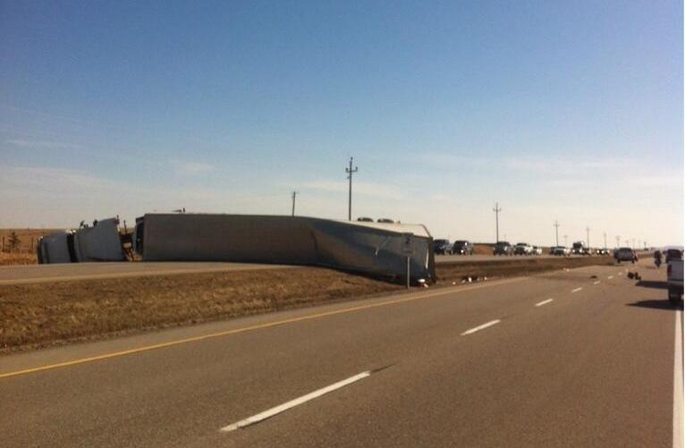 A semi-trailer flipped on Highway 2 near Cayley.
