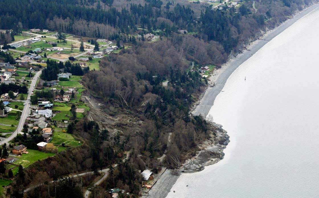 An aerial photo shows a landslide near Coupeville, Wash. on Whidbey Island, Wednesday, March 27, 2013.
