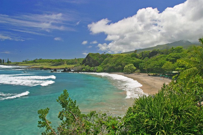 This undated file photo provided by Ron Dahlquist for the Maui Visitors Bureau shows Hamoa Beach in Maui, Hawaii. THE CANADIAN PRESS/AP, MVB, Ron Dahlquist.