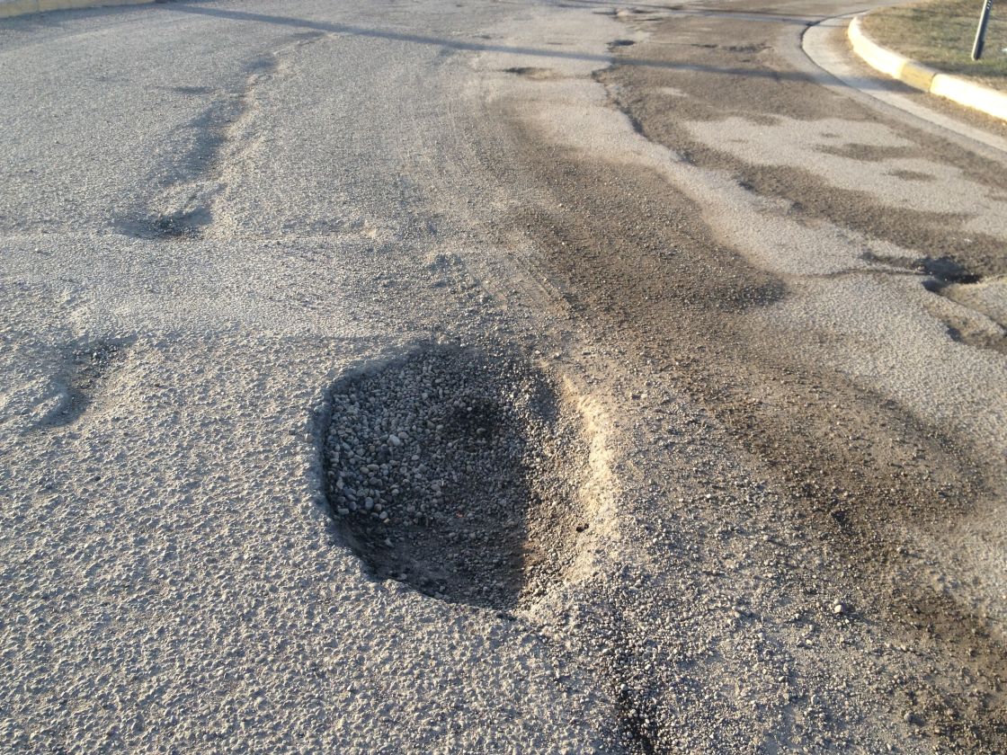 A pothole in downtown Edmonton, April 2013.