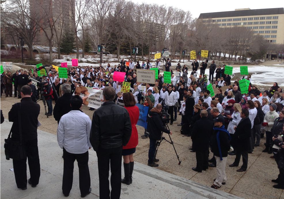 A rally at the Alberta legislature to protest the government's generic drug plan.