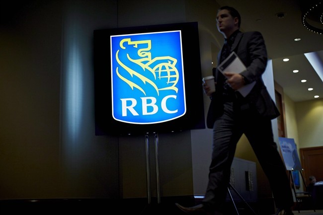 A shareholder leaves the Royal Bank of Canada annual meeting in Calgary, Feb. 28, 2013.T.