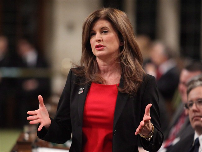 Public Works Minister Rona Ambrose responds during Question Period in the House of Commons on Parliament Hill in Ottawa in March 2013. During her seven years as a cabinet minister, some of them difficult, Ambrose has rarely been anything but cool and detached.But the public works minister briefly set aside her professional poise Tuesday when she was asked why she was taking such a personal interest in the heart-wrenching issue of cyberbullying. THE CANADIAN PRESS/ Patrick Doyle