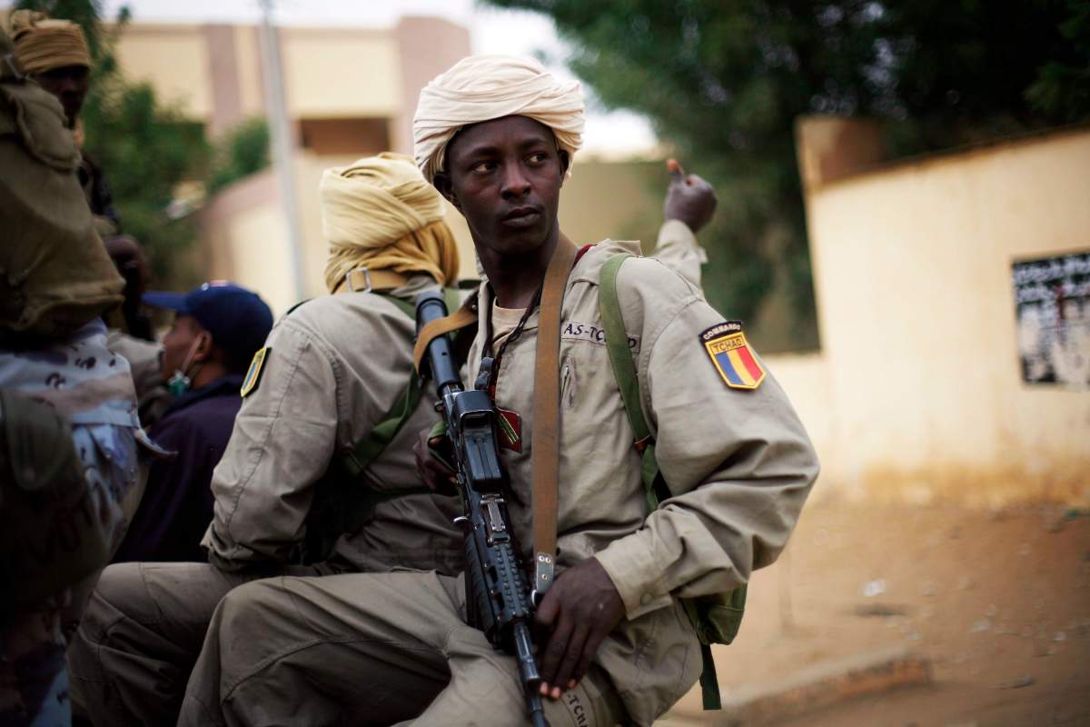 FILE -- In this picture taken Monday Jan. 28, 2013, Chadian soldiers patrol the streets of Gao, Northern Mali.