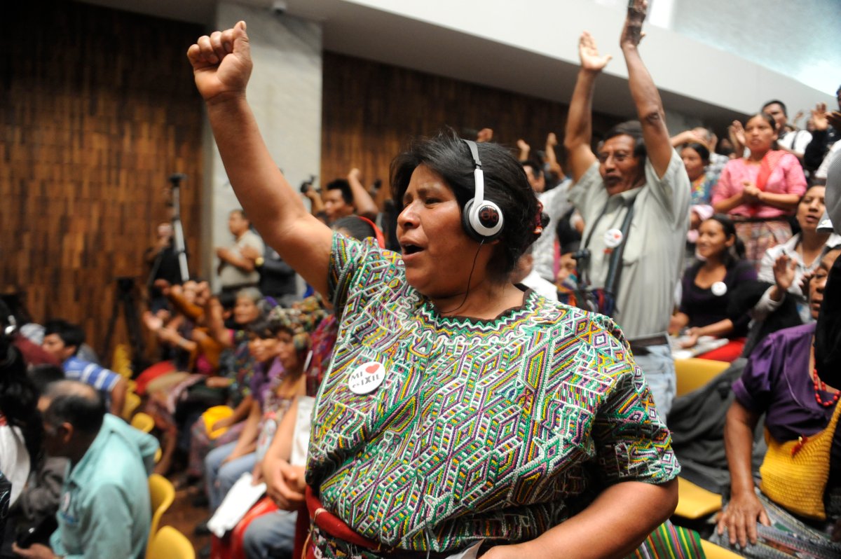 Ixil indigenous people, survivors of Guatemalan civil war, gesture in the Guatemalan Court of Justice in Guatemala City on April 19, 2013. 