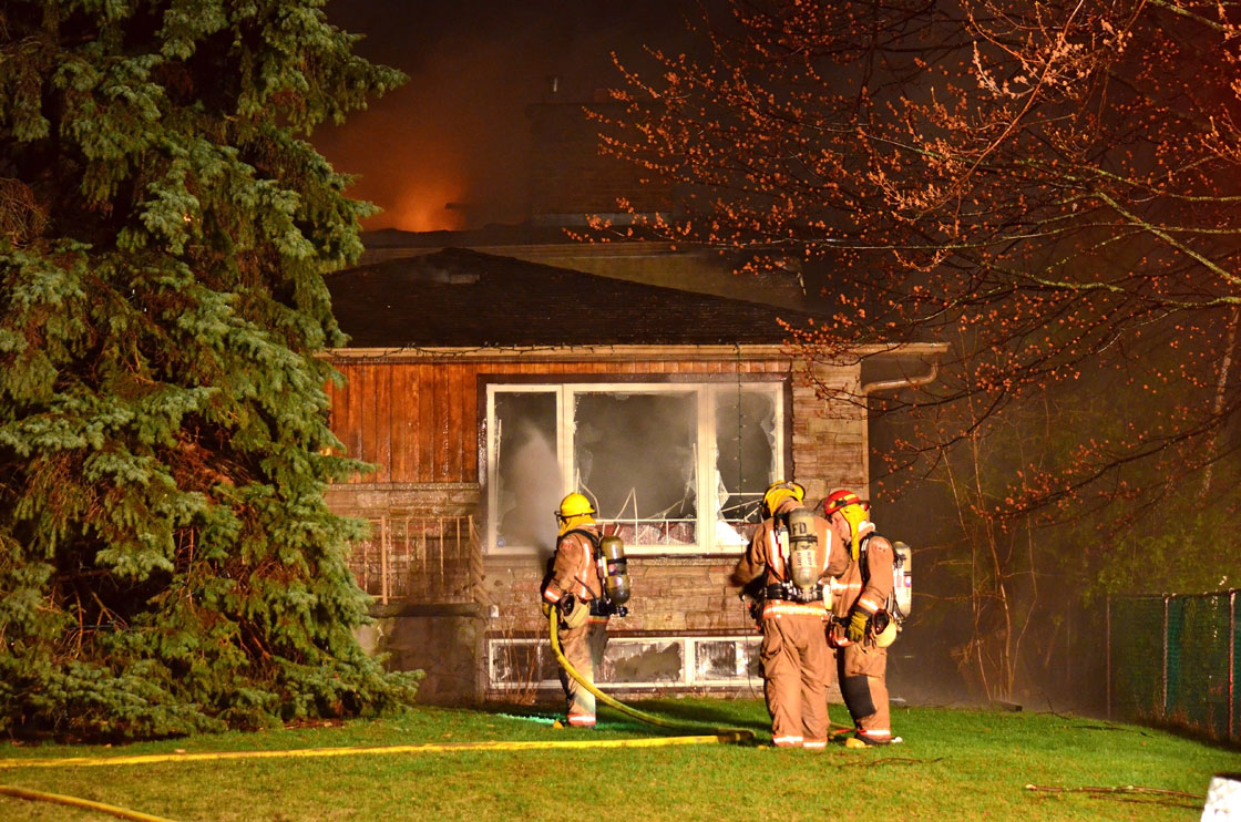 Firefighters battle an early morning blaze in Ajax on Wednesday, April 24, 2013. 