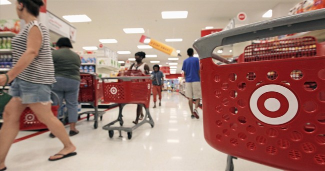 Target says its first-quarter adjusted profit will likely come in slightly below its forecast because of weaker-than-expected sales of seasonal and weather-sensitive items.