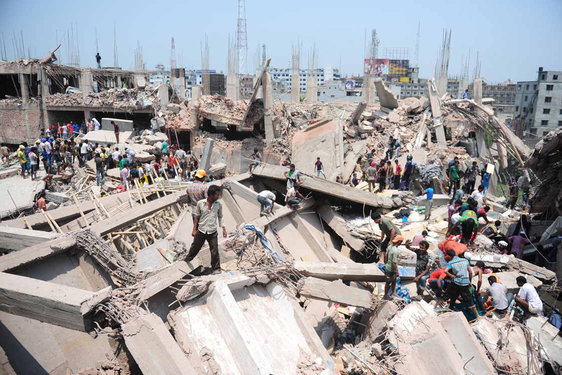 Bangladeshi civilian volunteers assist in rescue operations after an eight-storey building collapsed in Savar, on the outskirts of Dhaka. 