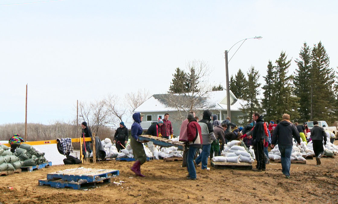 Rising floodwater forces residents in Borden, Saskatchewan to prepare for the worst on Tuesday.