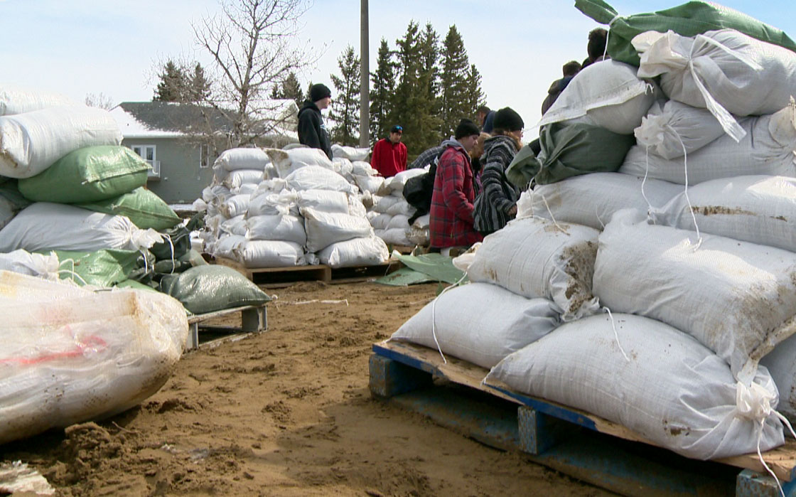 Rising floodwater forces residents in Borden, Saskatchewan to prepare for the worst on Tuesday.