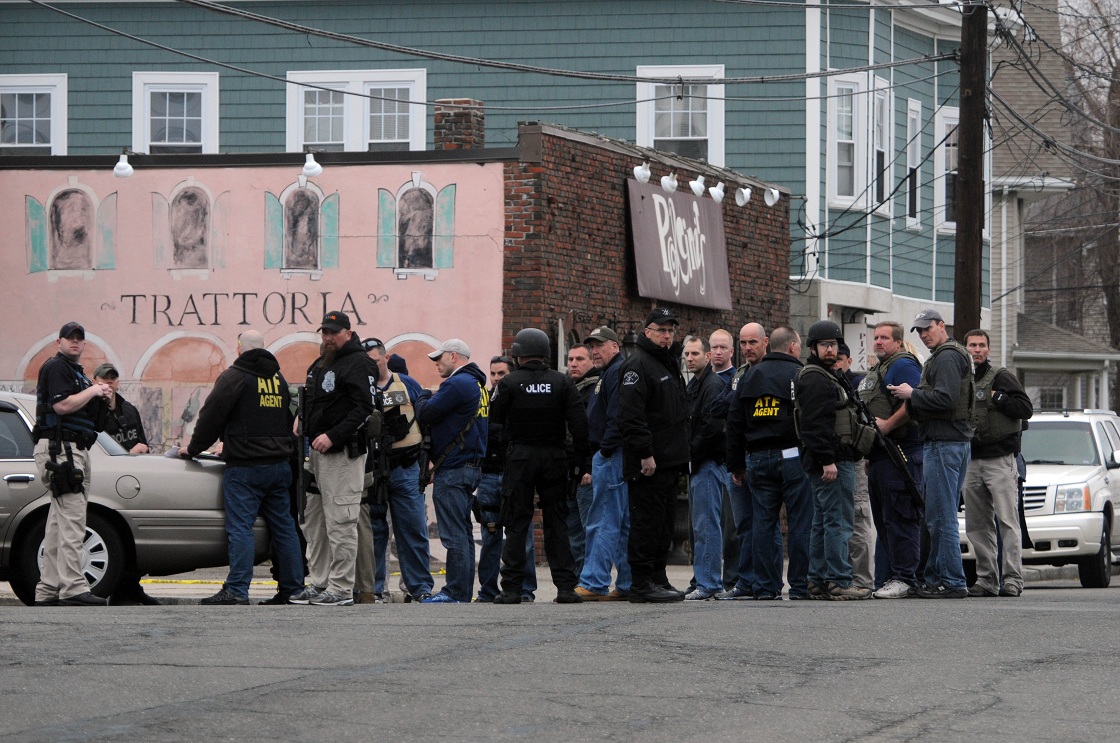WATERTOWN, MA - APRIL 19: Police convene on School and Walnut Street on April 19, 2013 in Watertown, Massachusetts.