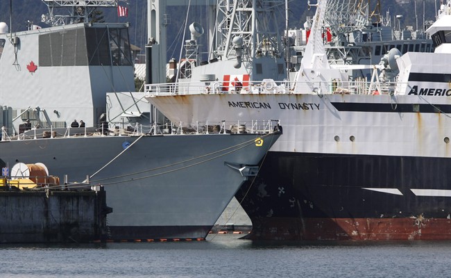 The American Seafood Company vessel American Dynasty (right) collides with the docked HMCS Winnipeg which has just undergone a massive refit and upgrade in Esquimalt, B.C., Tuesday April 23, 2013. The BC Ambulance Service says six people were taken to Victoria General Hospital with minor injuries.THE CANADIAN PRESS/ Chad Hipolito.