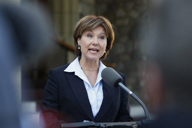 B.C. Liberal Leader Christy Clark answers questions from media following her meeting with Lieut.-Gov. Judith Guichon to dissolve the legislature at the Government House in Victoria, B.C. Tuesday April 16, 2013.