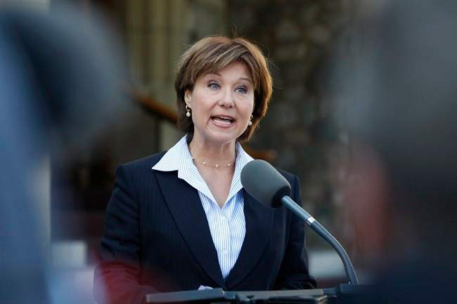 B.C. Liberal Leader Christy Clark answers questions from media following her meeting with Lieut.-Gov. Judith Guichon to dissolve the legislature at the Government House in Victoria, B.C. Tuesday April 16, 2013.