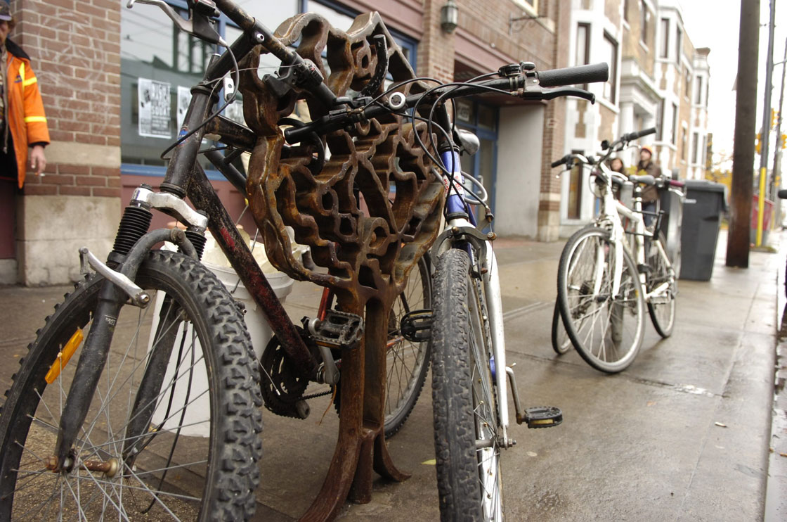 Bikes can be seen locked to bike posts along Queen Street West in this July 2010 file photo.