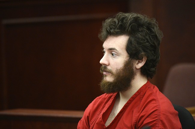 In this March 12, 2013 file photo, Aurora, Colo., theater shooting suspect James Holmes sits in the courtroom during his arraignment in Centennial, Colo. 