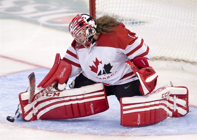 Team Canada goalie Shannon Szabados makes a save during second period action against Team Finland at the IIHF Womens World Ice Hockey championships in Ottawa on April 5, 2013. 