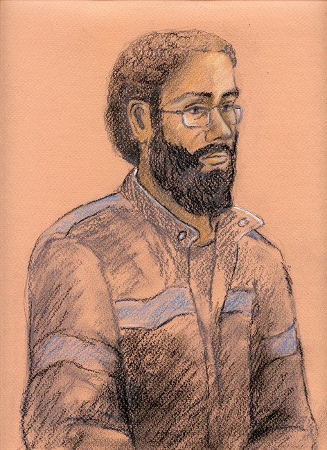 Chiheb Esseghaier appears in a Toronto courtroom on Wednesday, April 24, 2013 in this artist's sketch. Esseghaier, a man charged in an alleged al-Qaida-directed plot to attack a Via Rail passenger train was remanded in custody Wednesday after telling the court the Criminal Code is "not a holy book.".