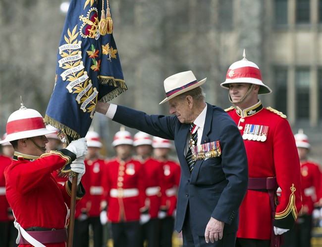 HRH Prince Philip presents a new Regimental Colour to the 3rd Battalion of The Royal Canadian Regiment at the Ontario Legislature in Toronto on Saturday April 27, 2012.