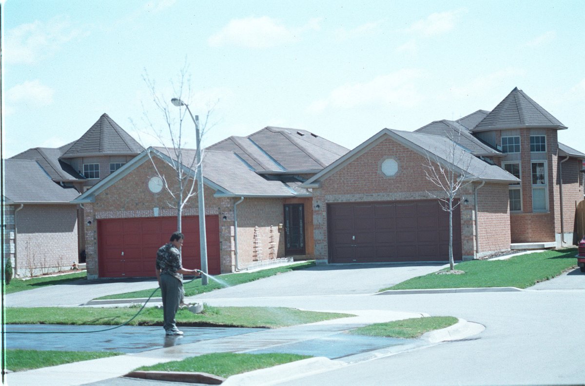 Houses at various locations in Brampton that are snout houses, or those with garages protruding out front.