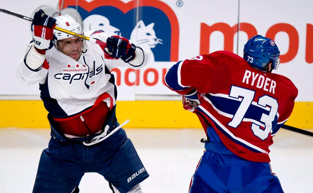 Montreal Canadiens' Michael Ryder and Washington Capitals' Alex Ovechkin collide during second period NHL hockey action Tuesday, April 9, 2013 in Montreal. 