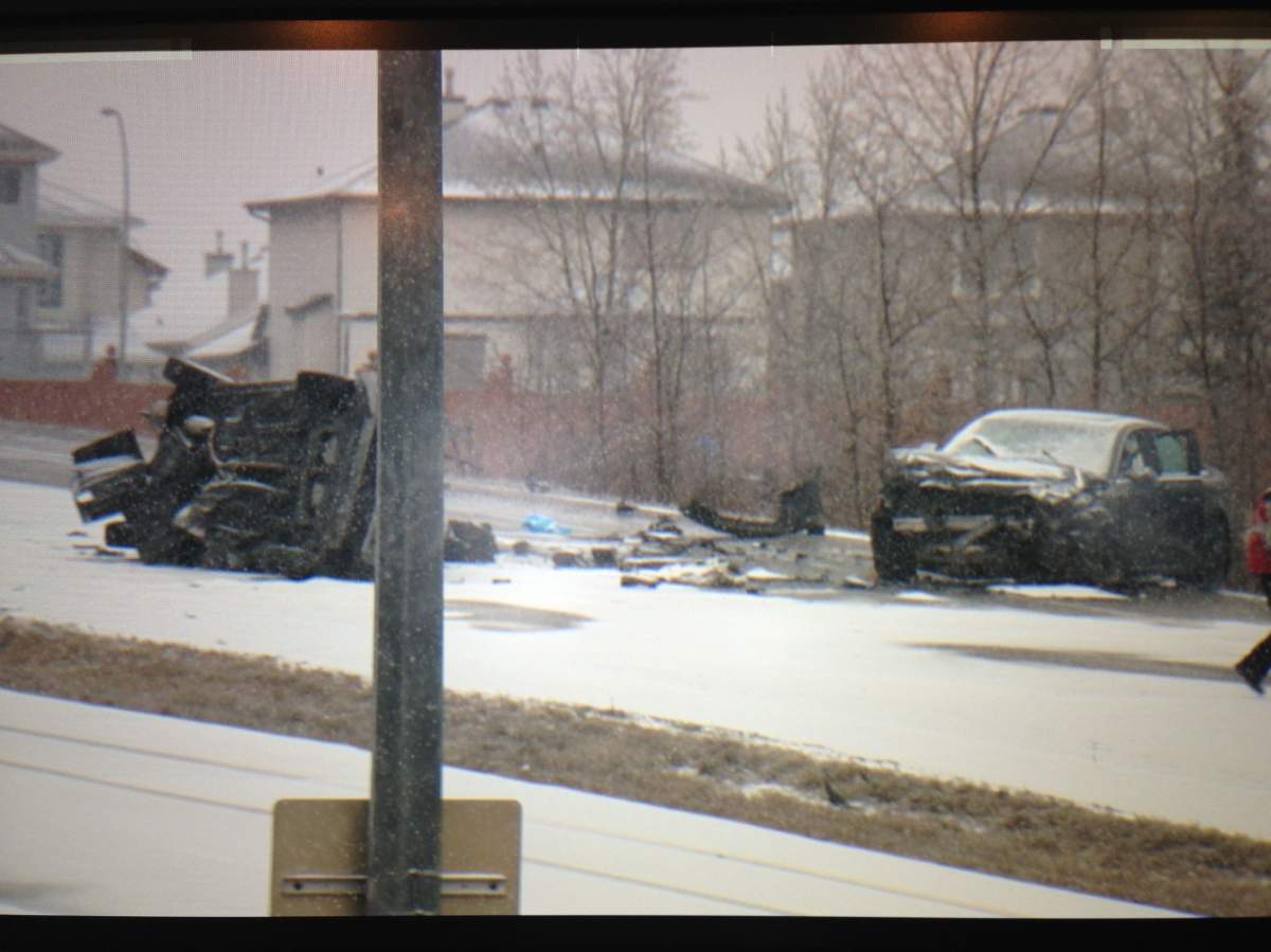 A woman in her 30s is dead and three others are injured, after a fatal head-on collision on the TransCanada highway just west of Valley Ridge Blvd on Sunday morning.