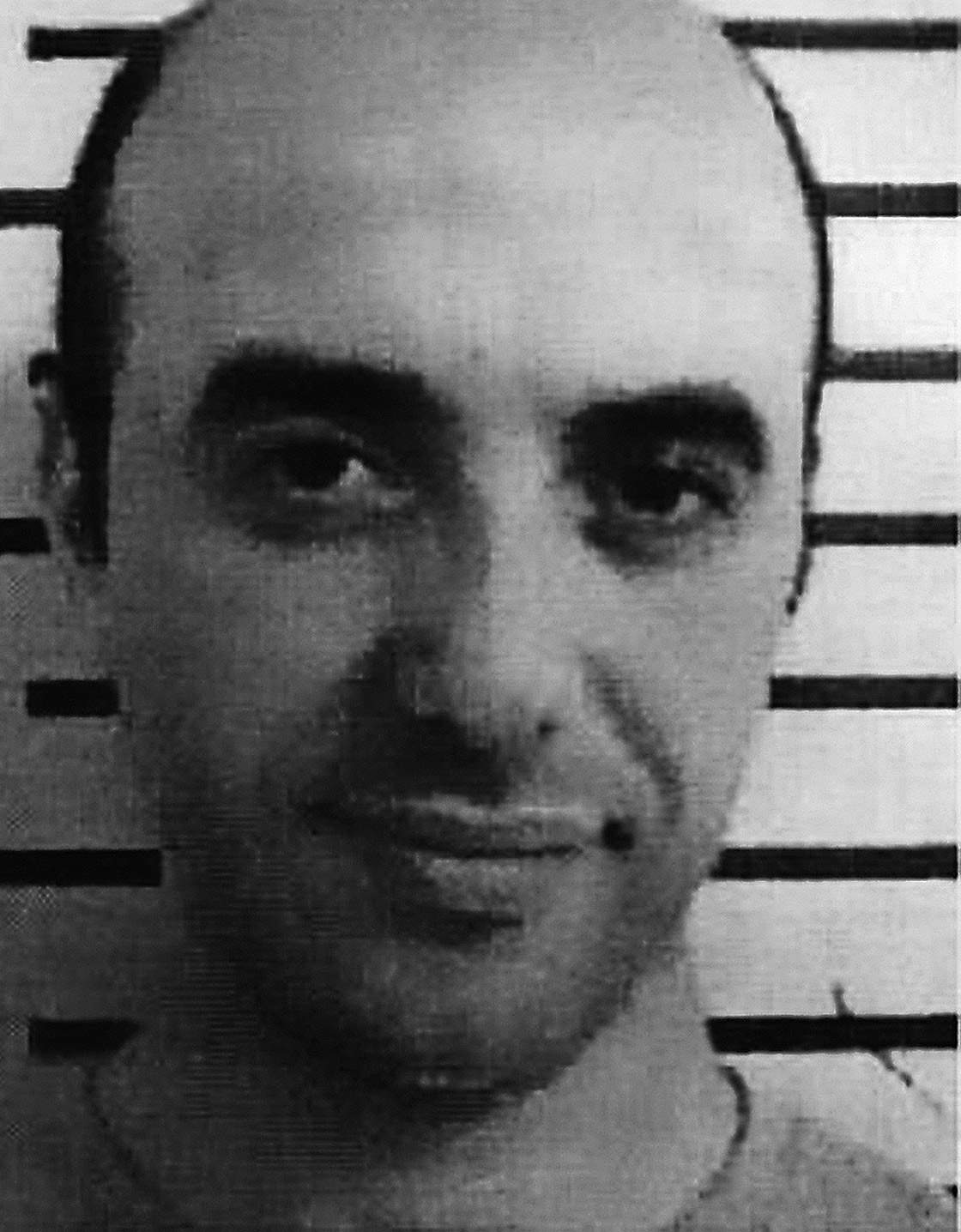 This undated police photo released by Interpol on Monday, April 15, 2013, shows French bandit Redoine Faid. 