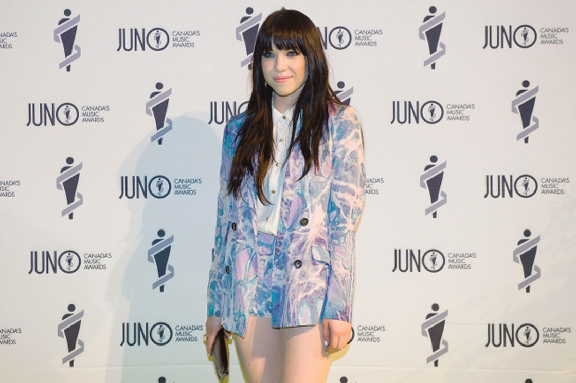 Carly Rae Jepsen poses for photographers at the first night of the Juno Awards in Regina.